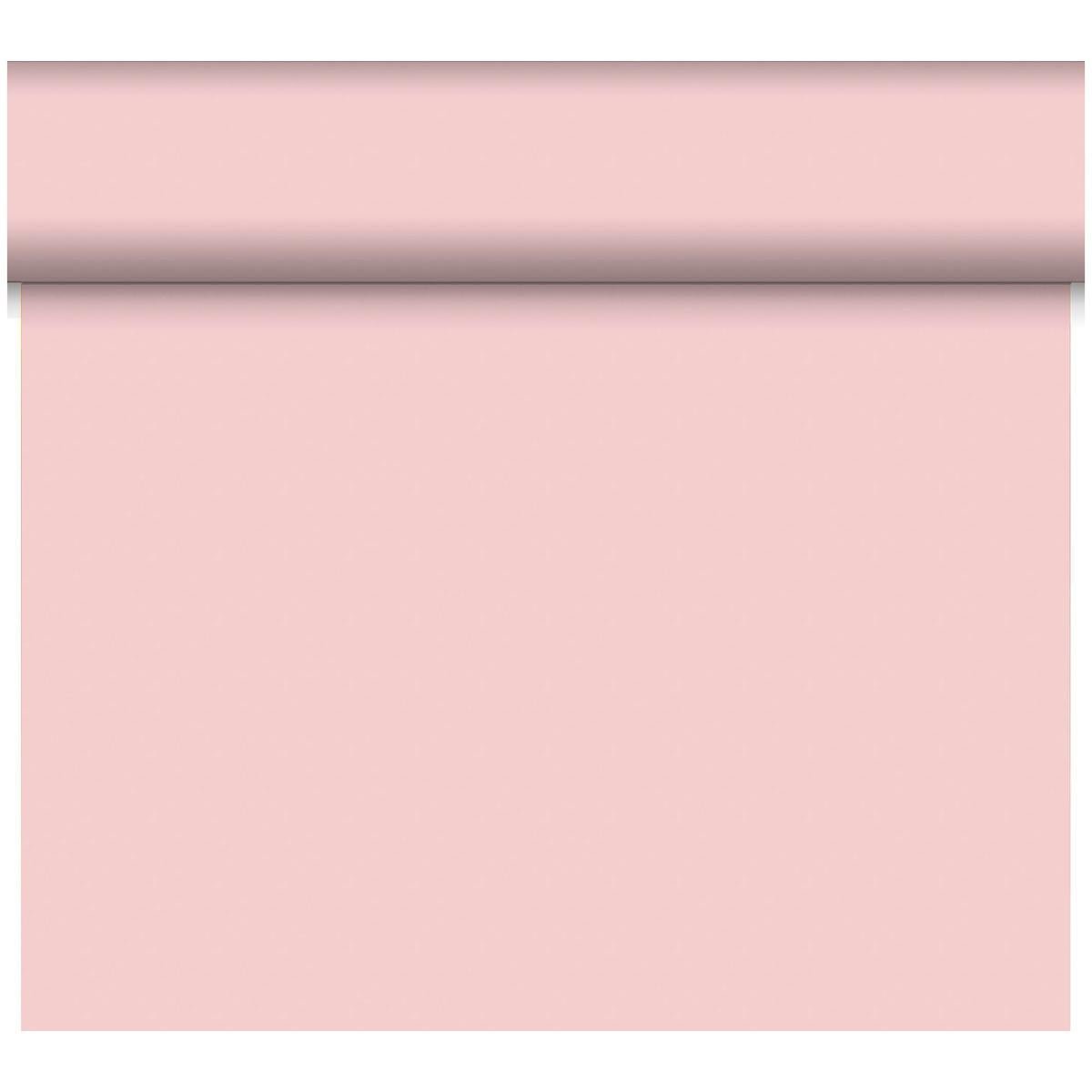A roll of Duni GmbH Bio-DC-Tete a Tete 0.4x24m light pink wallpaper is partially unrolled, revealing its smooth, solid surface; the top part remains rolled while the rest hangs vertically.
