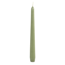 A pack of 50 chandelier candles 250x22 mm in pistachio green from Duni GmbH, each with a slightly wider base, stands upright against a white background - perfect for an elegant table decoration and adding subtle color to any setting.