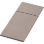 The Duniletto-Slim 40x33cm by Duni GmbH is a folded, rectangular, beige napkin with a visible crease, presented on a plain white background - ideal as a hygienic base for neat, practical use.