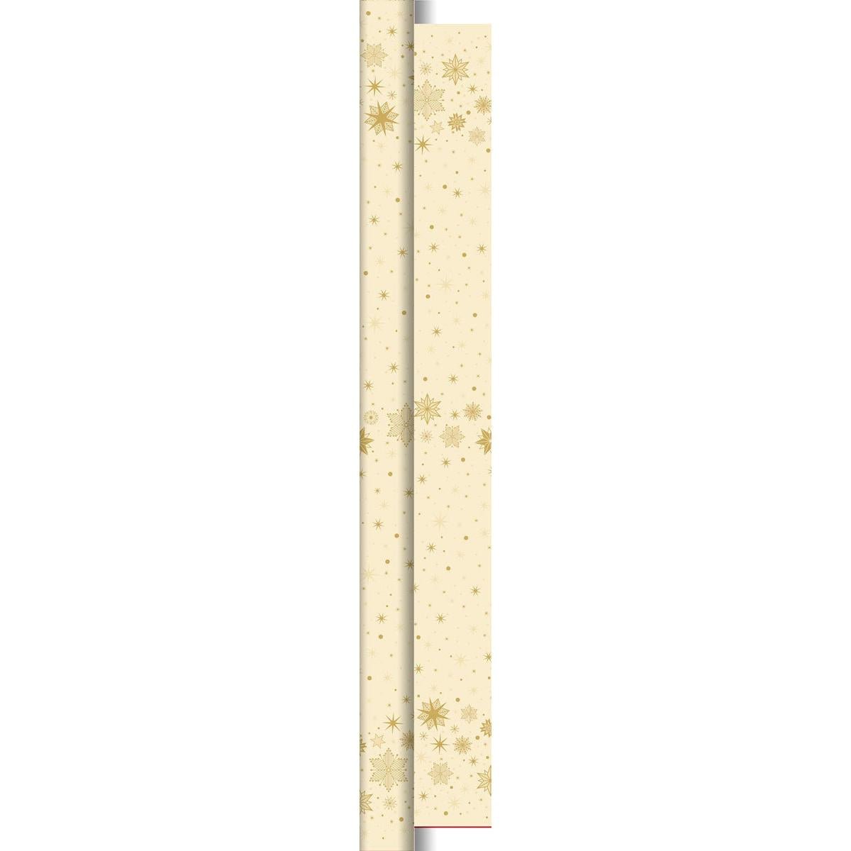 The Dunicel roll 25x1.18m Star Stargazing cream from Duni GmbH features a beige design with golden snowflakes and stars, ideal as table decoration. The roll casts a left shadow, giving the impression that it is partially unrolled or layered.
