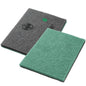 On a white background, two rectangular Diversey Deutschland Twister Pads for stone floor cleaning are depicted side by side: a green 'maintenance cleaning pad for stone floors' and a dark gray one, both with a coarse texture.