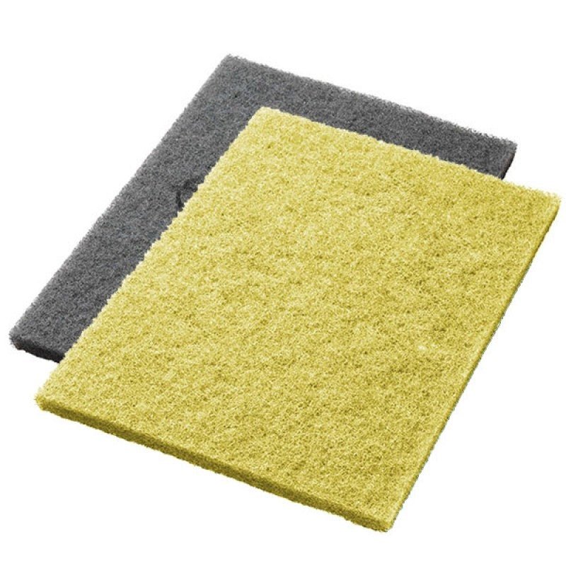 Two yellow Twister Pads from Diversey Deutschland GmbH & Co. OHG, specifically for stone floor renovation, are shown stacked on a white background. Each pad has a rough, fibrous texture and is delivered in a pack of 2.