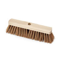 The Nölle Profi Brush Industrial Broom 30 cm Polycoconut with Handle Hole from Nölle Profi Brush Brush & Paint Technology e.K. is a wooden broom head with stiff brown bristles and a center hole for handle attachment, ideal for heavy industrial use.