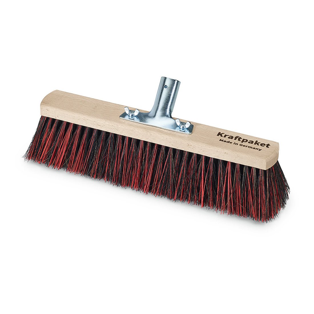 The Nölle Profi-Bürste Saalbesen Arenga/Elaston Master Quality has a wide head with dense black and red bristles, a sturdy wooden block, and a metal handle attachment. No handle included. Label "Powerhouse Made in Germany". By Nölle Profi Brush Bürsten- & Pinseltechnik e.K.