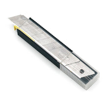 The Nölle Profi Brush Blade Dispenser with 10 snap-off blades (18 mm) contains replacement blades in a transparent case in a stylish black-silver design by Nölle Profi Brush Brush & Paintbrush Technology e.K.