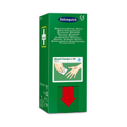 The green box (40 pieces) from Orkla Wound Care AB Salvequick savett wound cleaner (0.9% NaCl, sterile) is marked with a white cross, multilingual text, an illustration for cleaning hands, and a large red arrow pointing downwards on the lower part.