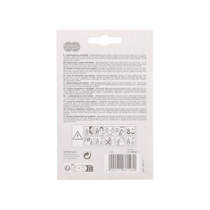 The packaging of the PAPSTAR anniversary candles with holder 7 cm "gold" (by PAPSTAR GmbH) is provided with multilingual text, safety symbols, and a barcode at the bottom edge. There is a hanging hole at the top center. Most of the text is small and not easily readable.