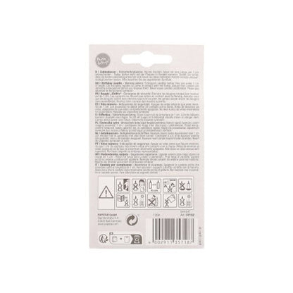 The back of a PAPSTAR number candle with holder 7 cm "gold" by PAPSTAR GmbH shows warnings in multiple languages, safety and recycling symbols, a barcode, and manufacturer information - ideal for birthday candles or cake decorations.