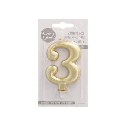 The PAPSTAR GmbH number candle with holder 7 cm "gold" is a stylish birthday candle in the shape of the number 3, ideal for cake decoration. It comes in a clear packaging with multilingual text "birthday candle" and a white cardboard back.