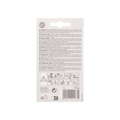 On the back of a PAPSTAR number candle with holder 7 cm "gold" packaging, there are texts in various languages, safety symbols, a recycling logo, a barcode, and small print manufacturer details of PAPSTAR GmbH.