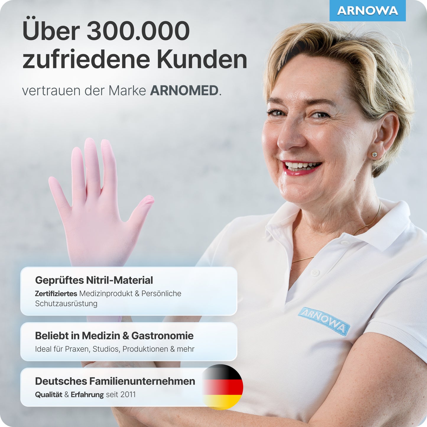 A smiling woman in a white polo and ARNOMED NITRIL BLOSSOM ROSE disposable gloves made of pink nitrile raises her gloved hand. The text refers to 300,000+ satisfied customers, the latex-free properties, and the company info of ARNOWA GmbH.