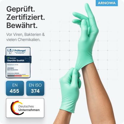 A person is wearing ARNOMED NITRIL PEPPERMINT GREEN Colorful Disposable Gloves made of mint green nitrile from ARNOWA GmbH. The image shows certification logos and a plaque, as well as a German text confirming that these latex-free gloves are tested for protection against viruses, bacteria, and chemicals.