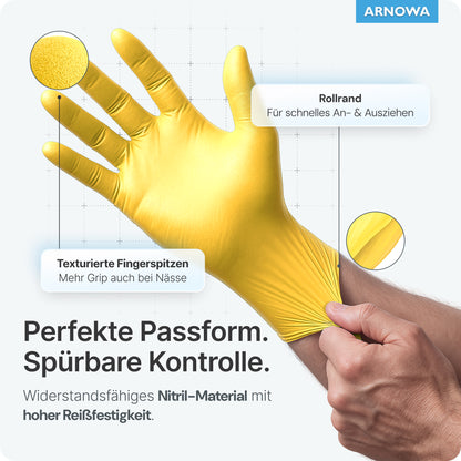 A hand is wearing an ARNOMED NITRIL SUNFLOWER YELLOW disposable glove from ARNOWA GmbH. The labels show the rolled cuff for easy handling and the textured fingertips for a good grip. German info: perfect fit, control, high tear resistance, latex-free.