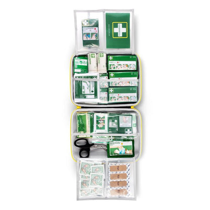 The Orkla Wound Care AB First Aid Kit LARGE (1 piece) contains labeled compartments with bandages, gauze, adhesive tapes, scissors, antiseptic wipes, gloves, wound dressings, and a first aid leaflet for emergencies.