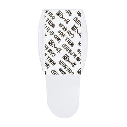 A 3M Command™ Mini Hook, transparent (17006CLRFGN) by 3M Deutschland GmbH, is seen from above - includes transparent strips with "3M Command" and "WALL" print, ideal for storage without drilling.