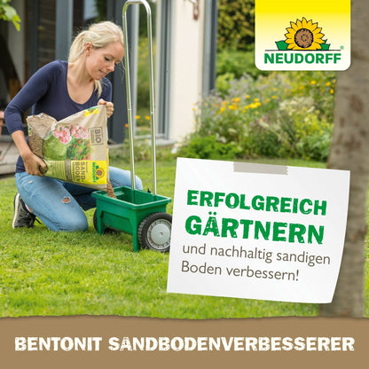 A person applies Neudorff Shop Bentonite Sand Soil Improver to a lawn with a green spreader to improve sandy soil with clay minerals. A sign reads: "Successfully garden and sustainably improve sandy soil!"