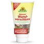 A white tube of Neudorff Shop Malusan wound sealant, a wound sealant for pruning wounds on woody plants, is adorned with German text, illustrations of tree bark and brush, yellow and red labels, and a sunflower logo at the top.