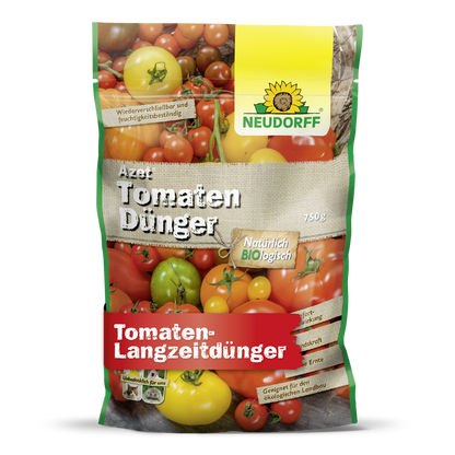 The 750g bag of Azet Tomato Fertilizer from Neudorff Shop is adorned with tomato motifs and a yellow sunflower logo. This organic complete fertilizer provides natural, long-term nutrients for abundant tomato harvests.
