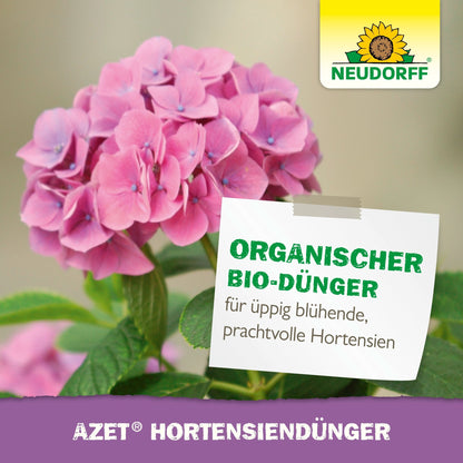 Pink hydrangea with green leaves. A label reads "Organic special fertilizer for lush, splendid hydrangeas". Neudorff Shop logo (sunflower) at the top right. Text at the bottom: "Azet Hydrangea Fertilizer liquid."