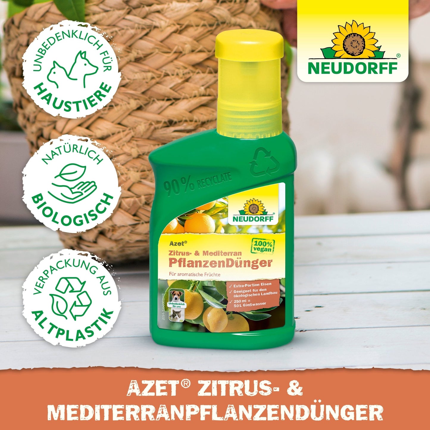 A green bottle of Neudorff Shop Azet Citrus & Mediterranean Plant Liquid Fertilizer stands on wood. Three symbols indicate it is pet-friendly, made from recycled plastic, and biodegradable. Ideal for Mediterranean plants like oleander. The text is in German.