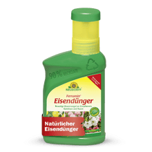 A green plastic bottle of Neudorff Shop Ferramin iron fertilizer with a yellow cap bears the label "natural iron fertilizer" and is intended as iron fertilizer and lawn fertilizer for ornamental plants and lawns against nitrogen deficiency.