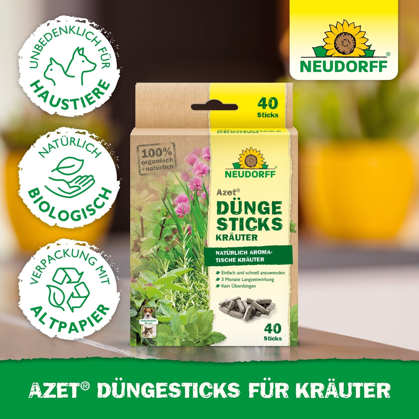 Azet Fertilizer Sticks for herbs from the Neudorff Shop with 40 organic sticks in animal-friendly, recyclable packaging are depicted. The label is visible, with green plants and potting soil in the background.