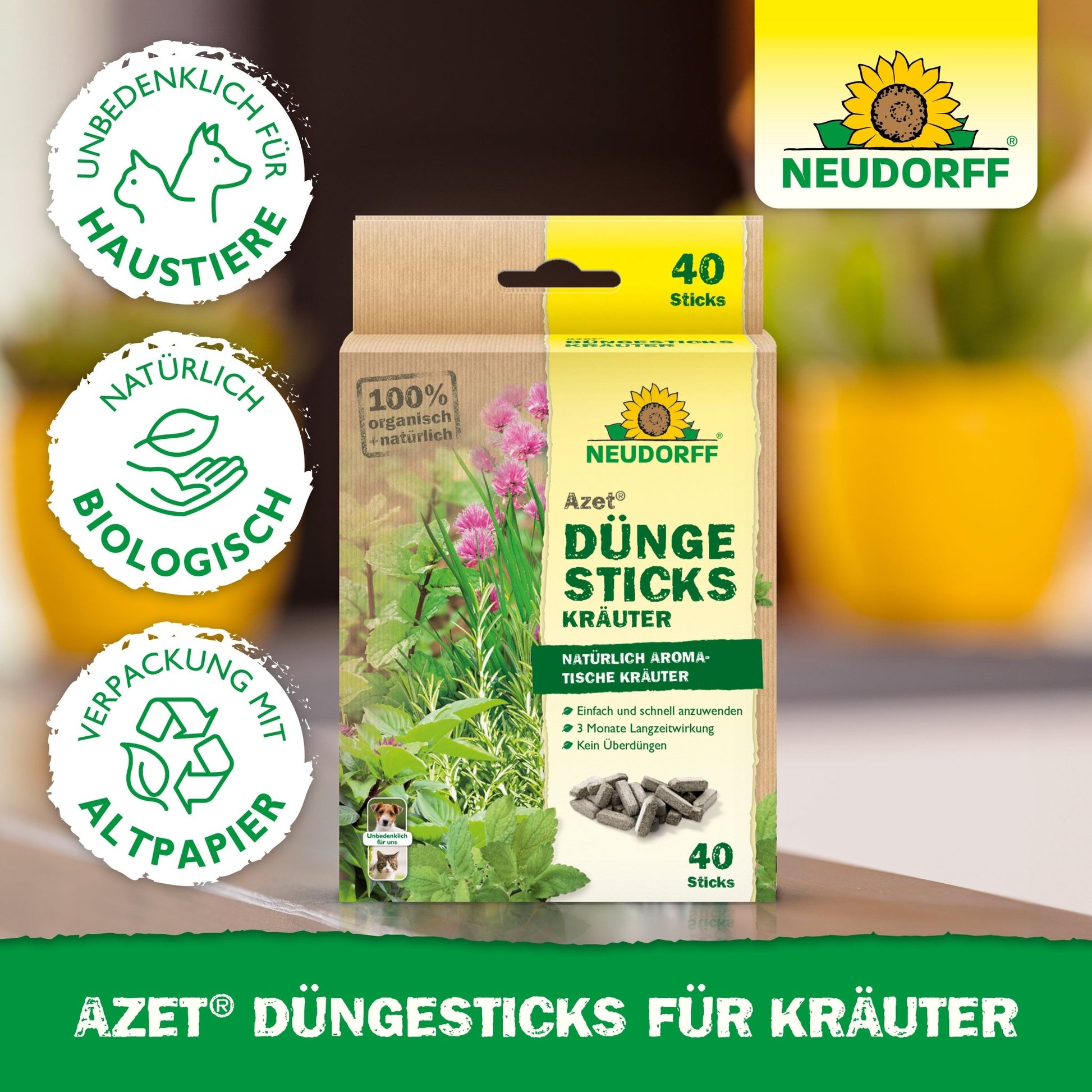 Azet Fertilizer Sticks for herbs from the Neudorff Shop with 40 organic sticks in animal-friendly, recyclable packaging are depicted. The label is visible, with green plants and potting soil in the background.