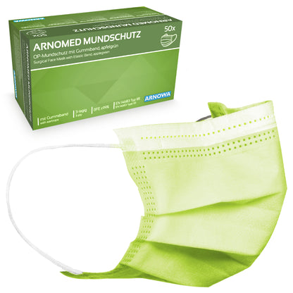 A green ARNOMED MOUTH PROTECTION TYPE IIR surgical mask with rubber bands from ARNOWA GmbH is in front of a green and white box indicating 50 pieces per pack.