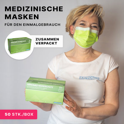 A person wearing a green medical mouth protection holds an ARNOMED MOUTH PROTECTION TYPE IIR surgical mask with rubber bands Type IIR box from ARNOWA GmbH. The caption reads: "Medical masks for single use," "packaged together," and "50 pcs/box."