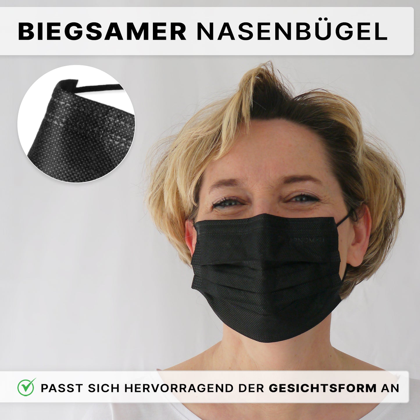 A person with short blonde hair wears an ARNOMED MOUTH PROTECTION TYPE IIR surgical mask with rubber bands from ARNOWA GmbH. The black disposable mask with a flexible nose bridge is seen in a close-up, with German text indicating the adjustable fit.