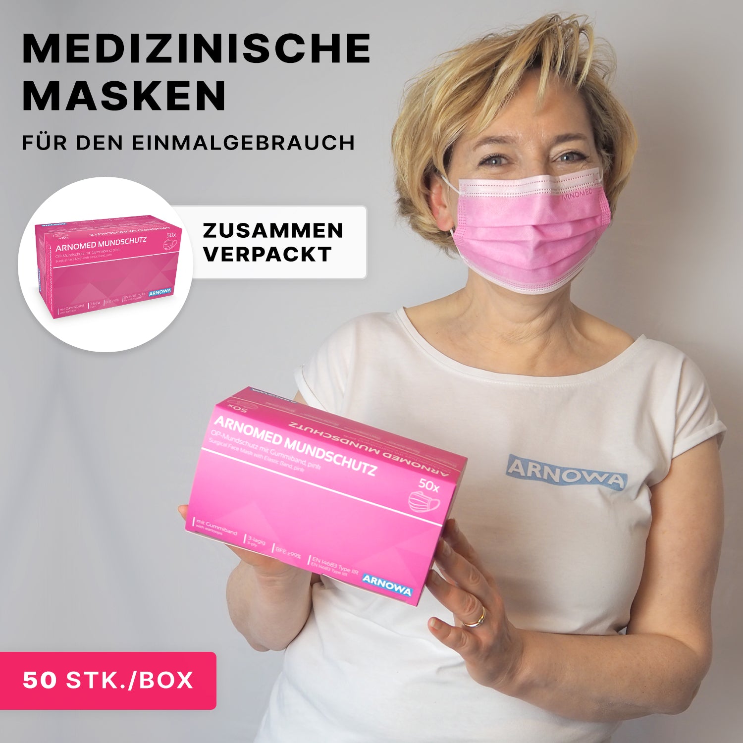 A woman with a pink medical mask holds a pink box labeled "ARNOMED MUNDSCHUTZ TYPE IIR" from ARNOWA GmbH. These disposable surgical masks with ear loops (Type IIR) are packed 50 pieces per carton.