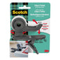 The Scotch™ Clip & Twist Tape Dispenser C19 from 3M Deutschland GmbH is depicted in packaging with a roll of Scotch® Magic™ Invisible Tape (19 mm × 8.89 m) attached to the edge of a table. Branding and usage instructions are visible.