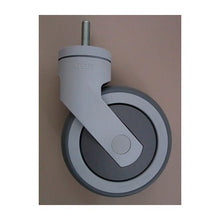A single Protect Trolley replacement wheel from Diversey Deutschland GmbH & Co. OHG, gray with threaded pin, stands vertically on a plain, light brown background. The package contains 1 piece.