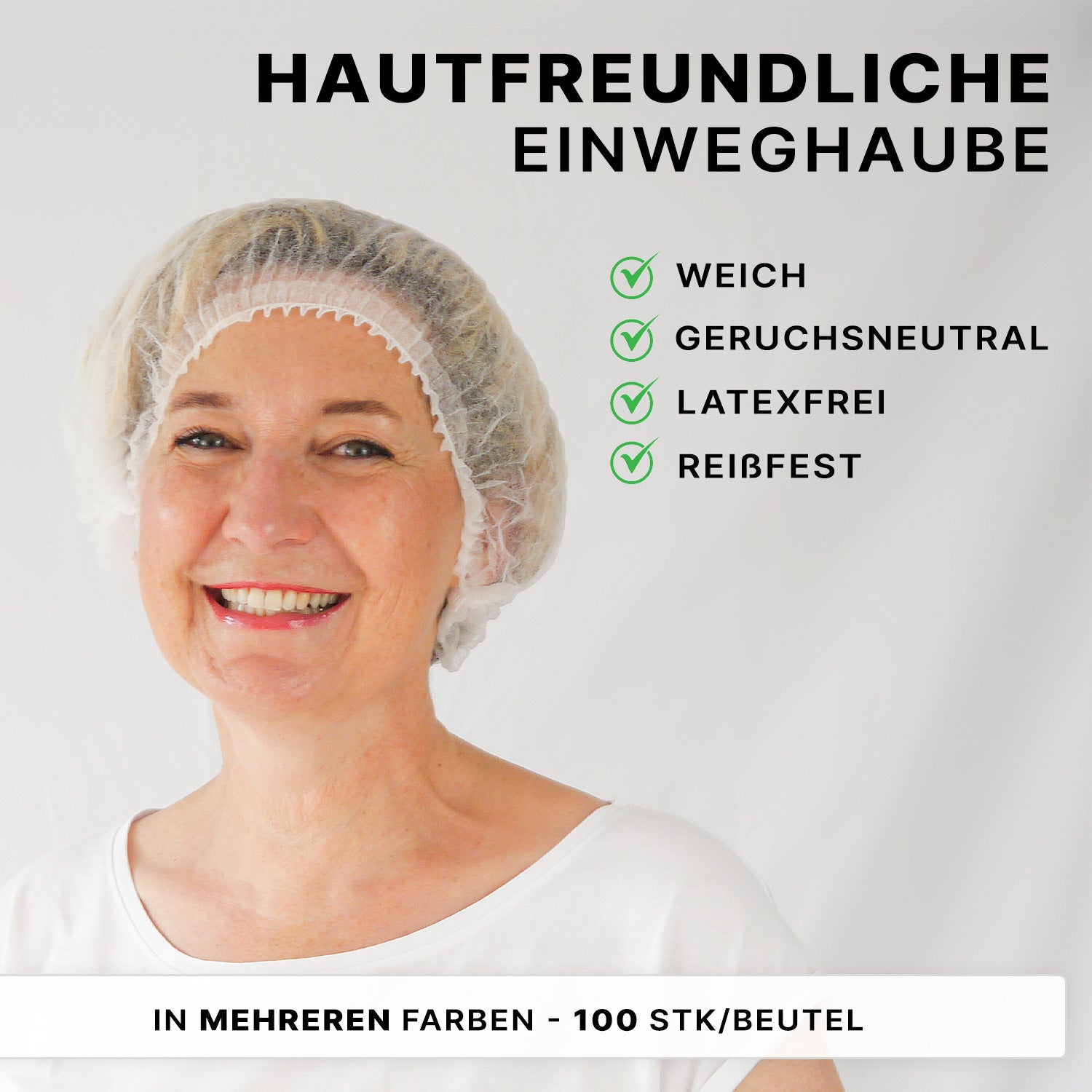 Smiling older woman wears ARNOMED COVER PP-CLIP CAP XL (55cm, ARNOWA GmbH), a soft, odorless, latex-free, tear-resistant disposable hair protection made of hygiene PP fleece. Available in various colors. 100 pieces per bag.