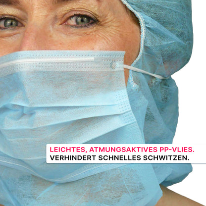 A person wears the ARNOMED COVER PP-ASTROHAUBE WITH 2-LAYER MOUTH PROTECTION from ARNOWA GmbH; their lower face is visible. The lightweight, breathable mask material helps prevent quick sweating.