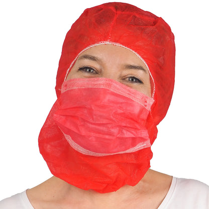 A person wears the ARNOMED COVER PP-ASTROHAUBE WITH 2-LAYER MOUTH PROTECTION from ARNOWA GmbH - both, red fleece head protection and face mask - over a white shirt against a white background.