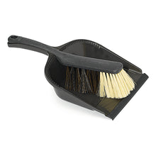 The Nölle Profi Brush sweeping set quality mix from Nölle Profi Brush Bürsten- & Pinseltechnik e.K. consists of a compact broom with light and dark bristles and a black dustpan; the handle can be stored in the pan for easy storage.