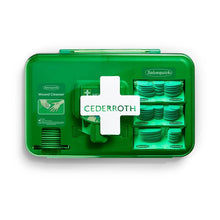 A blue Orkla Wound Care AB wound care dispenser (1 pack), containing wound care products and bandaging material, stands against a white background.