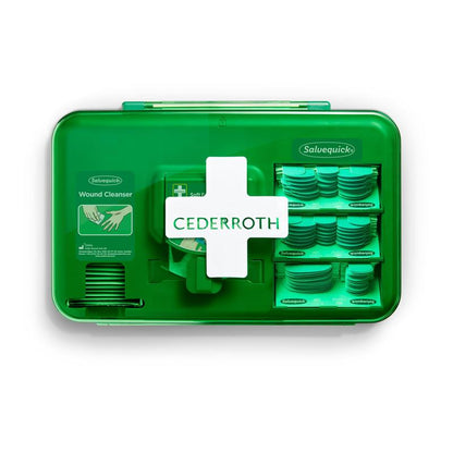 A blue Orkla Wound Care AB wound care dispenser (1 pack), containing wound care products and bandaging material, stands against a white background.