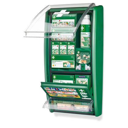 The Cederroth first aid station by Orkla Wound Care AB is a green wall box with a transparent lid and organized, labeled compartments containing first aid materials and an illustrated guide on the front. Delivered as 1 pack (carton).