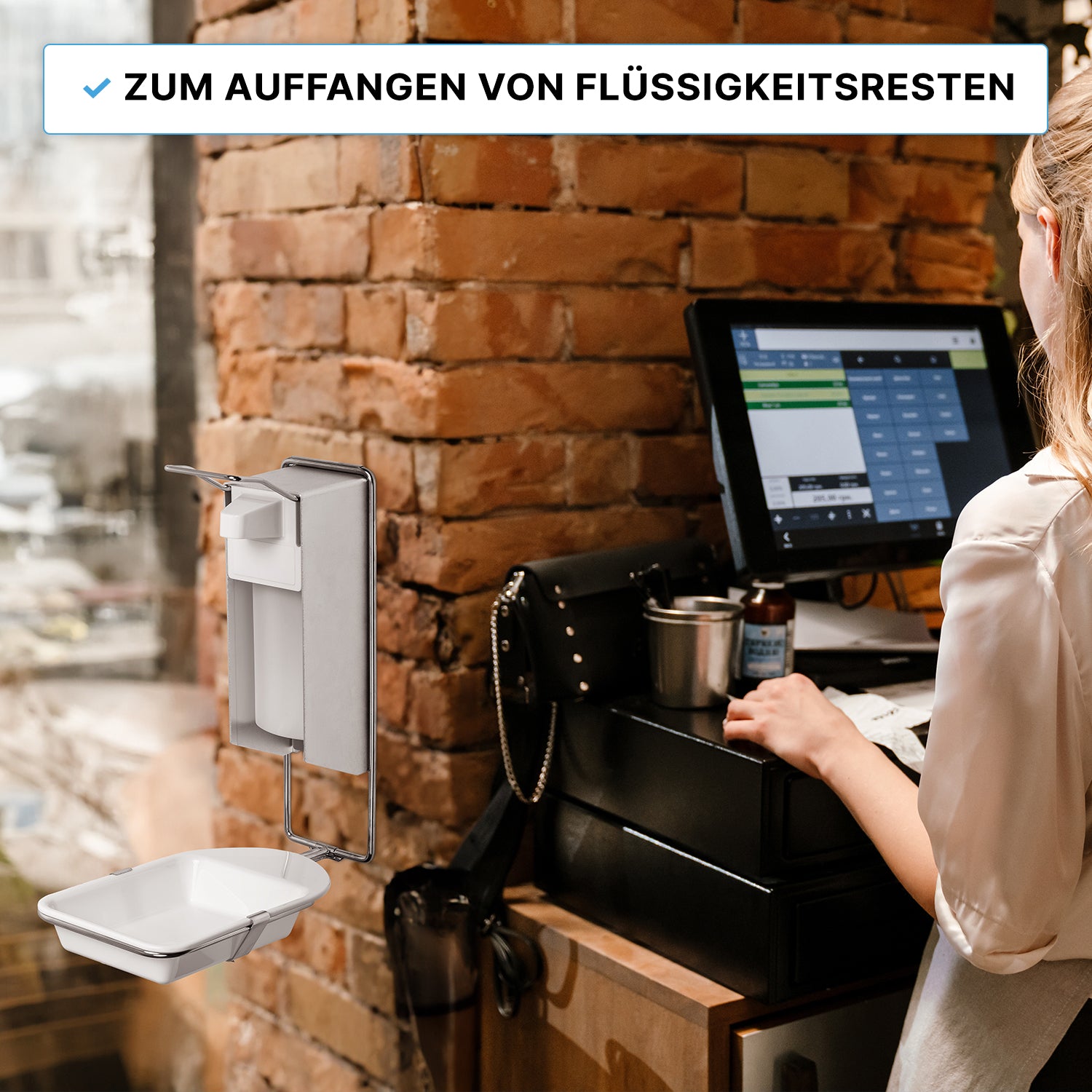 A woman stands at a restaurant checkout terminal. In the image, the ARNOWA GmbH ARNOMED DISPENSER DRIP TRAY can be seen, a drip tray for ARNOMED DISPENSER soap and disinfectant dispensers, mounted on a brick wall to catch liquid residues.