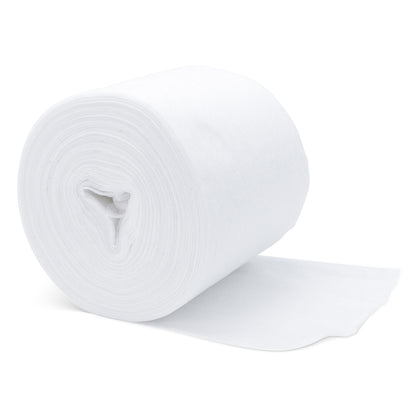 A large roll of ARNOMED DRY WIPES dry non-woven cloth rolls from ARNOWA GmbH, with one end unrolled and lying flat on a white background, resembles medical dry wipes used for the application of disinfectants in clinical settings.