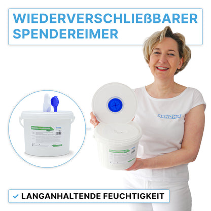 A woman in a white shirt holds the ARNOMED dispenser bucket for non-woven cloth rolls from ARNOWA GmbH with a blue lid in her hand. Both open and closed buckets are depicted, with the German text highlighting the resealable design and the permanent disinfection moisture protection.