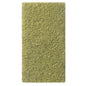 The Twister Handpad 2 pcs. from Diversey Deutschland GmbH & Co. OHG is a rectangular, green pad with a rough, fibrous texture and compact design, depicted against a white background.