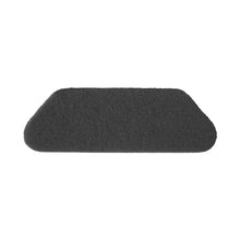 The TASKI Americo S-Pad 45 x 15 cm Black from Diversey Germany is a rectangular, black, highly aggressive floor cleaning pad for intensive cleaning of various floor coverings. The package contains 1 piece. Pictured on a white background.