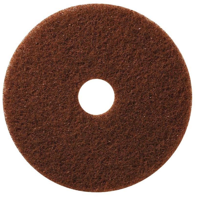 A brown, round TASKI Americo Pad Brown—an aggressive deep-cleaning pad from Diversey Deutschland GmbH & Co. OHG, featuring a rough texture and a central hole—is shown from above against a white background.