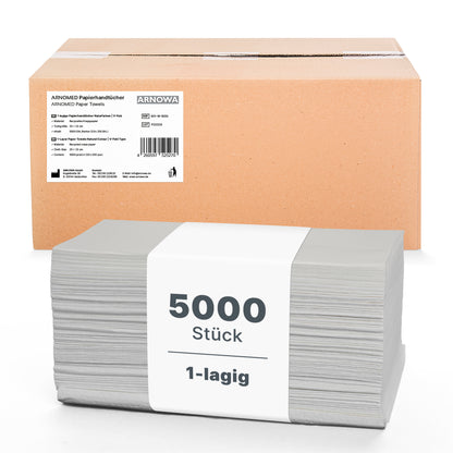 A 5,000-pack of ARNOMED PAPER TOWELS 25 x 23 cm | V-FOLD from ARNOWA GmbH is stacked in front of a brown box, wrapped with a white band labeled "5000 pieces 1-ply" - ideal single-ply towels for washrooms.
