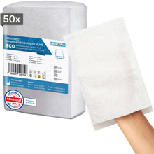 Pictured is a bag with 50 ARNOMED disposable wash gloves made of molton from ARNOWA GmbH. One glove is worn on a hand, in the background the Dermatest seal and the product label can be seen.