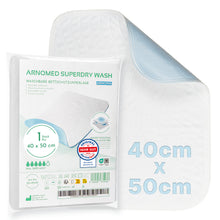 The ARNOMED SUPERDRY WASH Washable Bed Protection Pad by ARNOWA GmbH, 40x50cm, white with light blue underside and Superdry technology. Packaging with product details and care instructions in German.