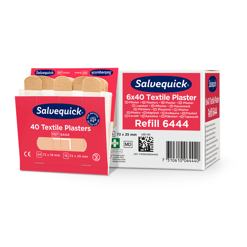 An opened box of Orkla Wound Care AB textile plaster, 40 pcs./refill lies next to a closed package (6 pieces), in which several beige plasters for wound care are visible.